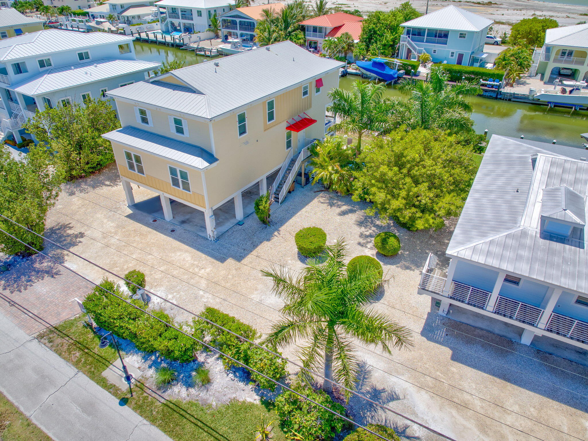 231 Sombrero Beach Road, Unit 1 Marathon, FL 33050 - Photo 44 of 52 an aerial view of a house with a yard