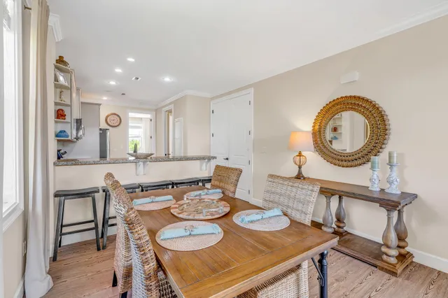 a view of a dining room with furniture and a table
