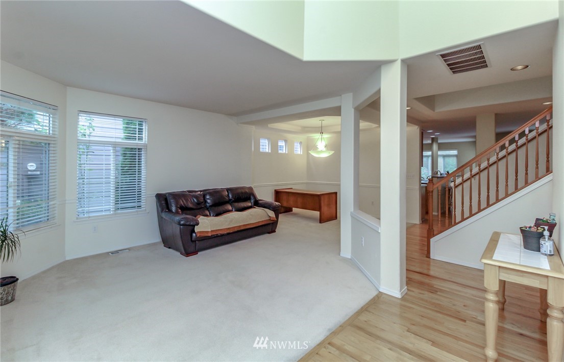 18547 173rd Way Southeast Renton, WA 98058 - Photo 3 of 27 a living room with furniture and a window