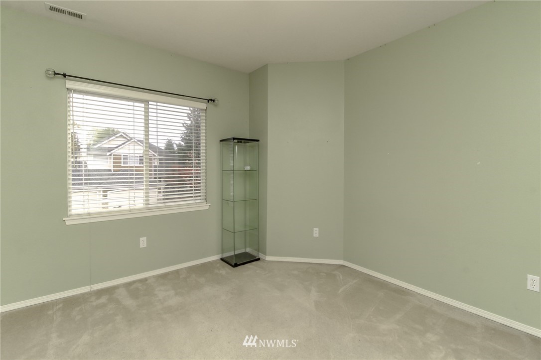 18547 173rd Way Southeast Renton, WA 98058 - Photo 23 of 27 an empty room with a window