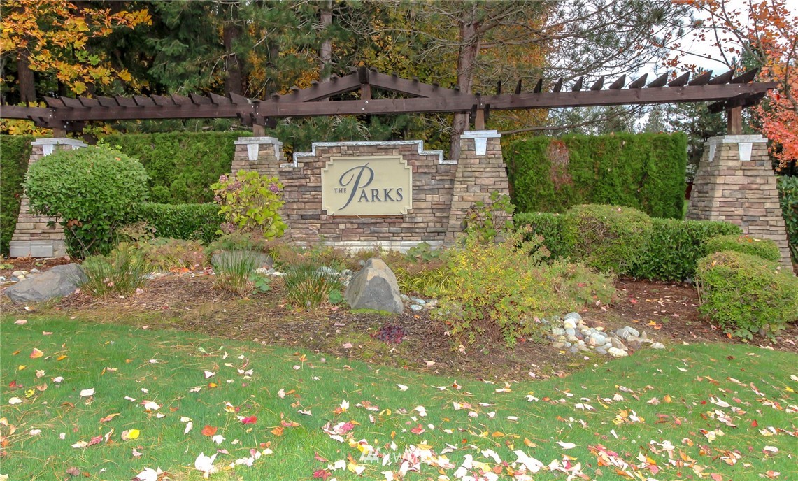 18547 173rd Way Southeast Renton, WA 98058 - Photo 26 of 27 a view of a park with iron fence