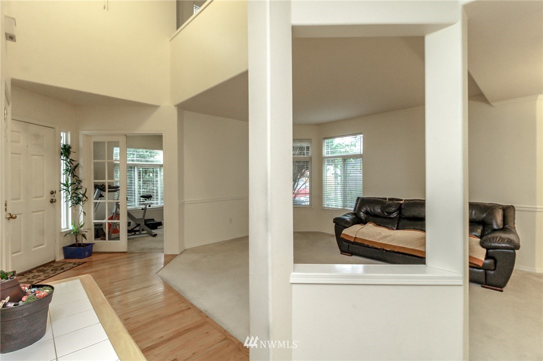 18547 173rd Way Southeast Renton, WA 98058 - Photo 4 of 27 a view of living room and bedroom