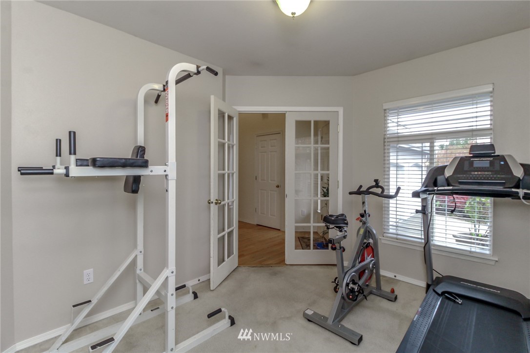 18547 173rd Way Southeast Renton, WA 98058 - Photo 6 of 27 a view of a workspace with furniture and a window