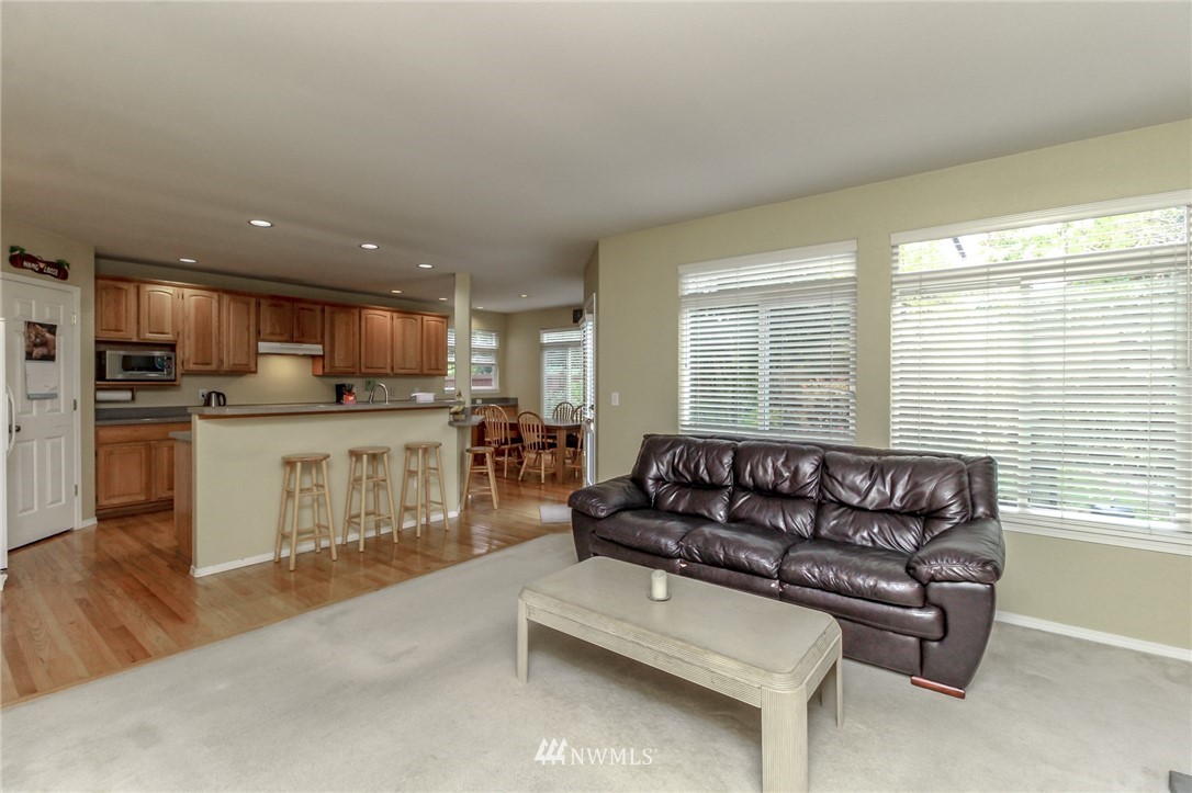 18547 173rd Way Southeast Renton, WA 98058 - Photo 9 of 27 a kitchen with a refrigerator and a sink