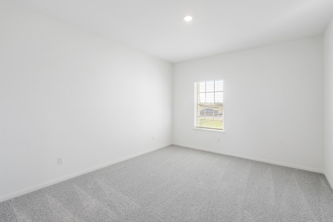 120 Paria Court Jarrell, TX 76537 - Photo 6 of 8 a view of an empty room with a window