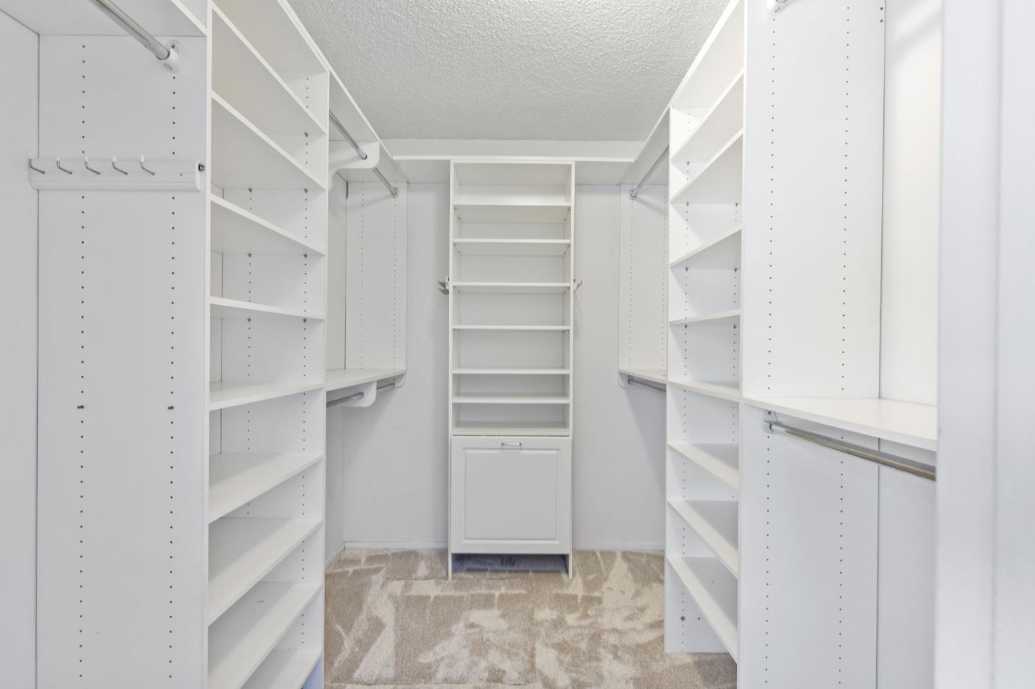 2012 Beverly Avenue Clovis, CA 93611 - Photo 9 of 42 a view of walk in closet with empty racks