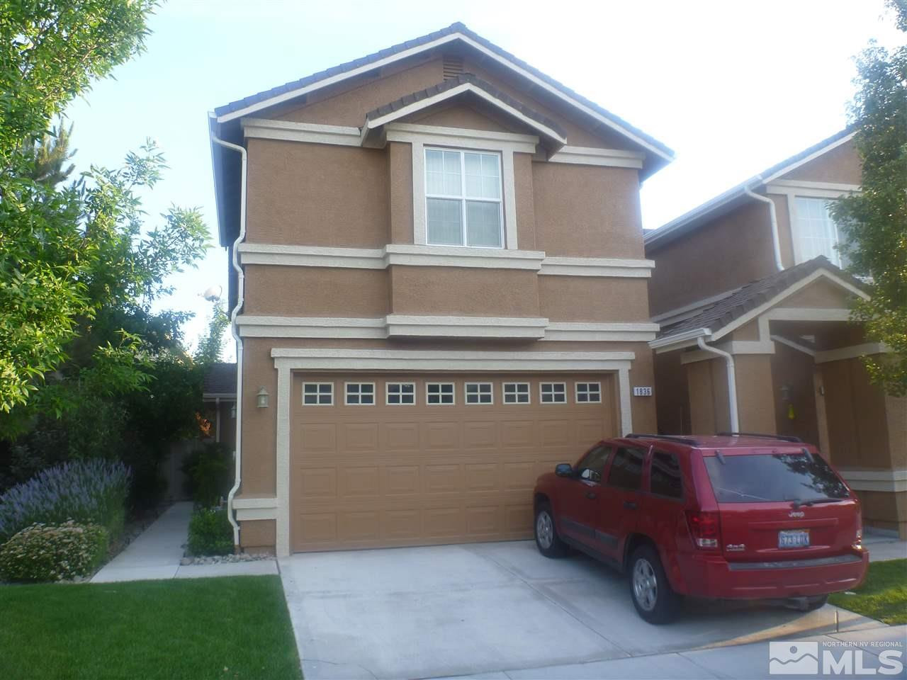 1836 Resistol Drive Reno, NV 89521 - Photo 1 of 1 a front view of a house with a garden