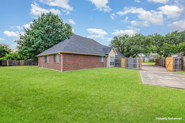 a house view with a garden space
