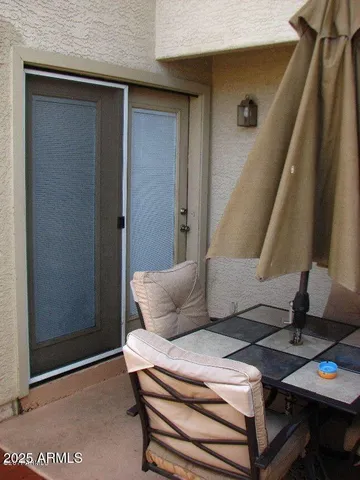 a living room with furniture and a window