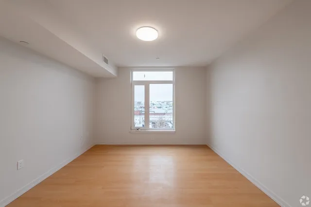 an empty room with a window