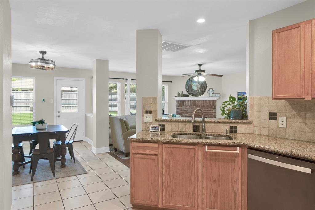 514 Brighton Ct Road Wylie, TX 75098 - Photo 3 of 25 a kitchen with a sink and cabinets