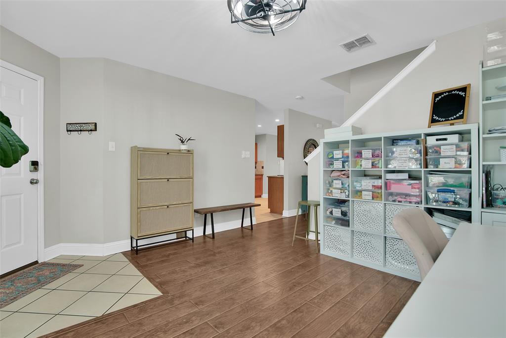 514 Brighton Ct Road Wylie, TX 75098 - Photo 5 of 25 a view of a livingroom with furniture and an empty room