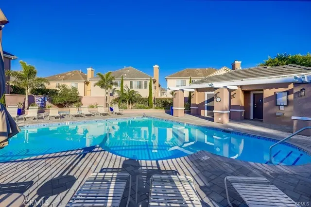 a view of a building with a yard