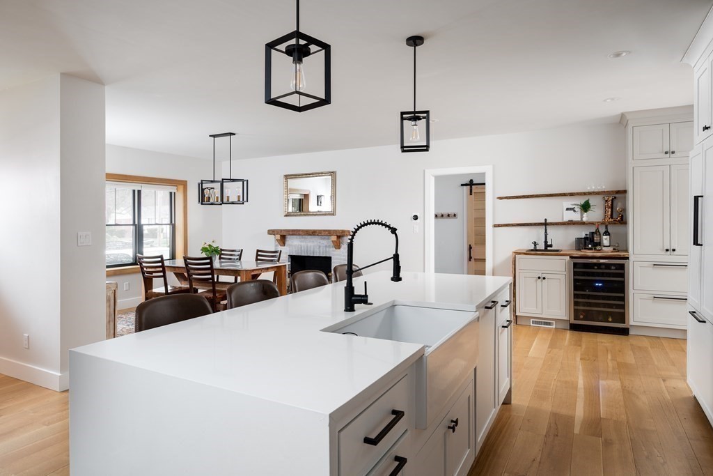 100 Gerald Road Milton, MA 02186 - Photo 11 of 42 a kitchen with stainless steel appliances a sink and a stove
