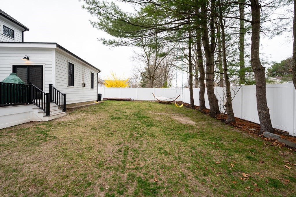 100 Gerald Road Milton, MA 02186 - Photo 39 of 42 a view of a house with a yard