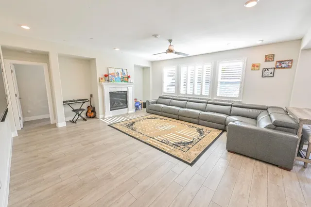 a front view of a house with a yard table and chairs