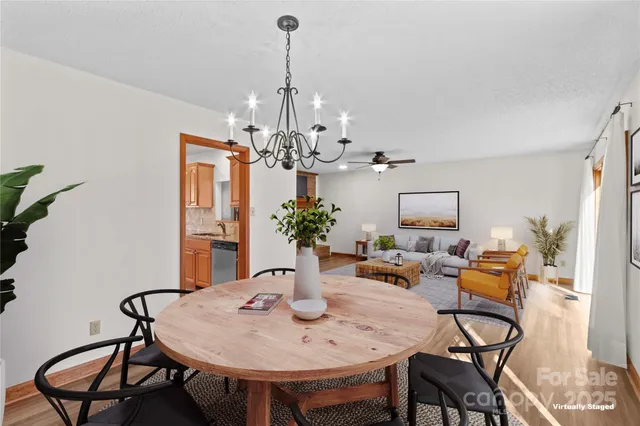a kitchen with stainless steel appliances granite countertop a refrigerator sink and cabinets
