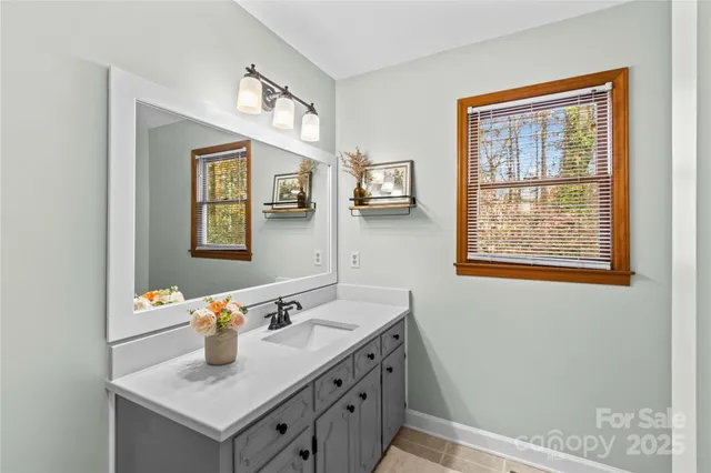 a view of workspace with wooden floor and windows