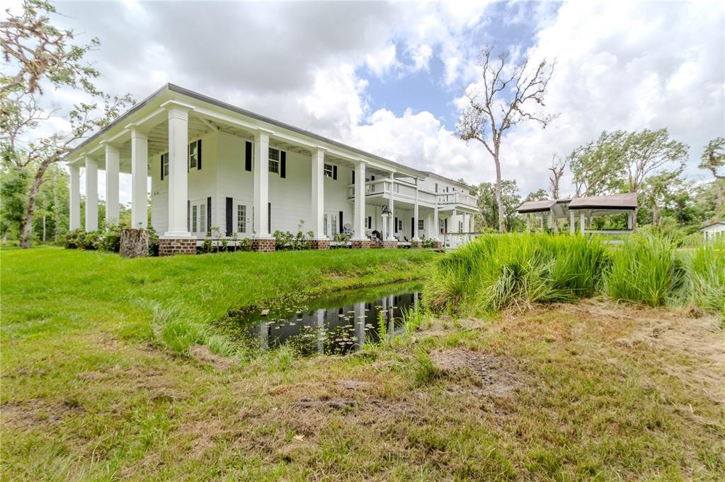 500 South Fort Christmas Road Christmas, FL 32709 - Photo 11 of 25 a view of a house with a yard