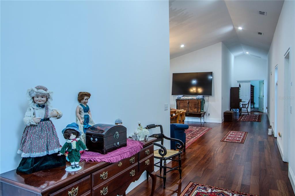 500 South Fort Christmas Road Christmas, FL 32709 - Photo 25 of 25 a living room with furniture and a flat screen tv