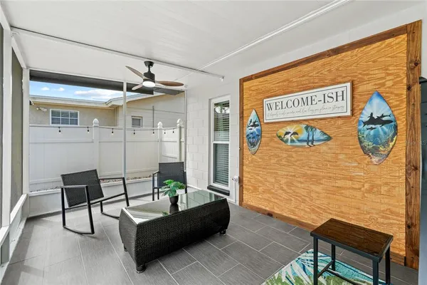 a outdoor space with patio furniture and windows