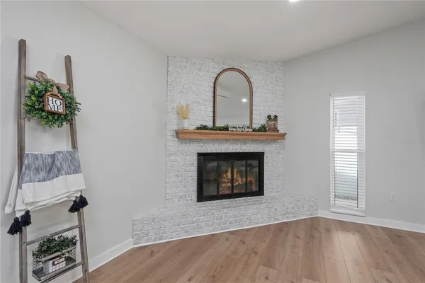 a kitchen with stainless steel appliances a refrigerator and a stove top oven