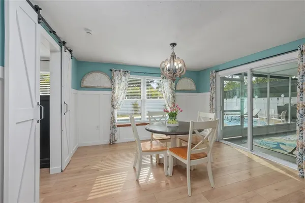 a bedroom with a bed and a ceiling fan