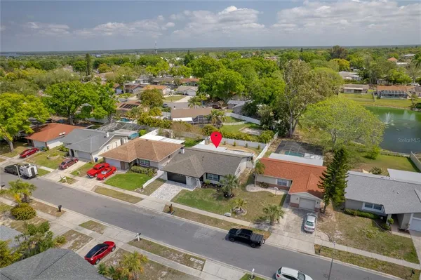 an aerial view of a houses with outdoor space