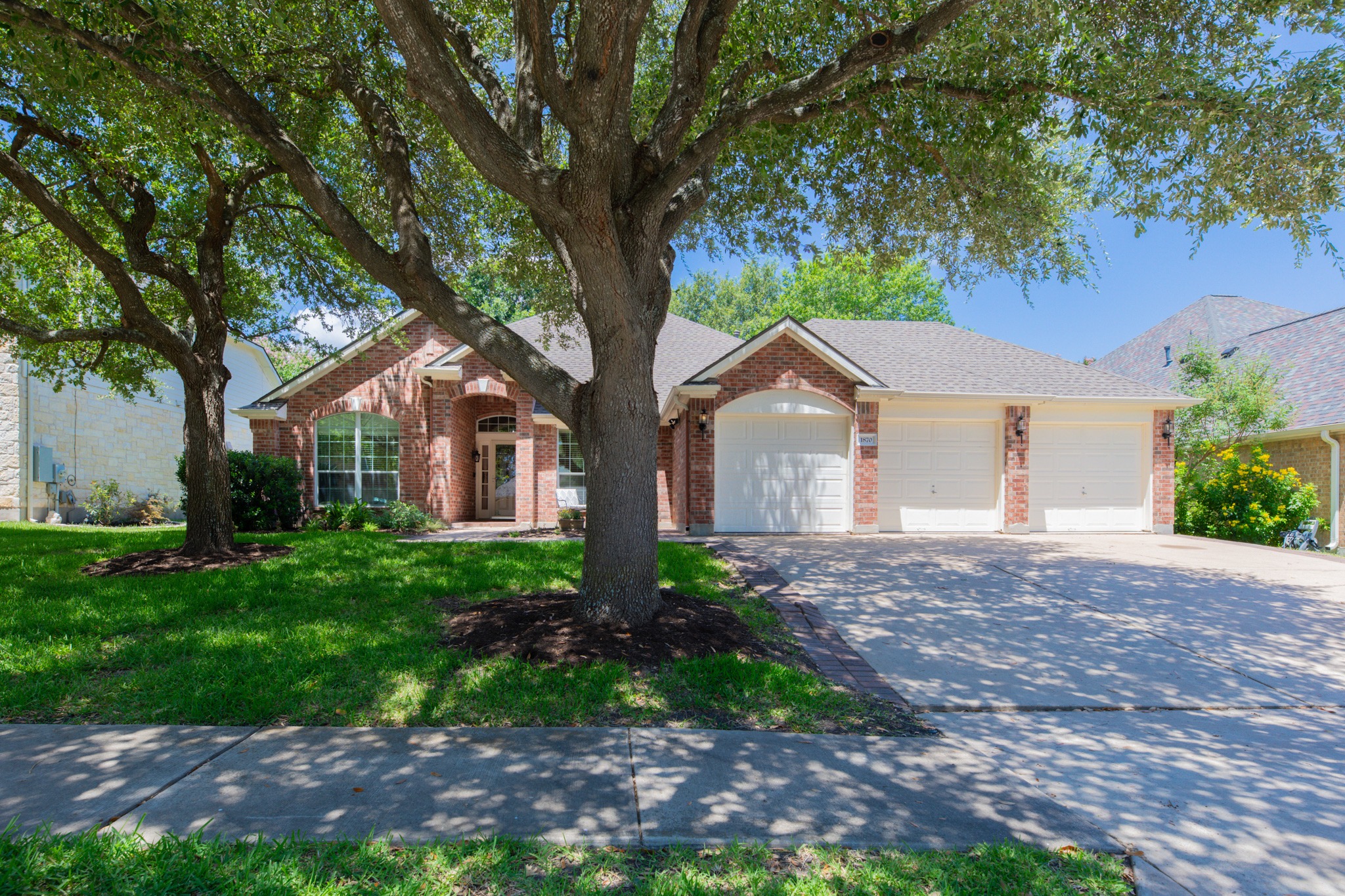 Exceptional 1-Story in highly sough-after Sonoma. Brick exterior with a welcoming arched entryway and a spacious three-car garage.