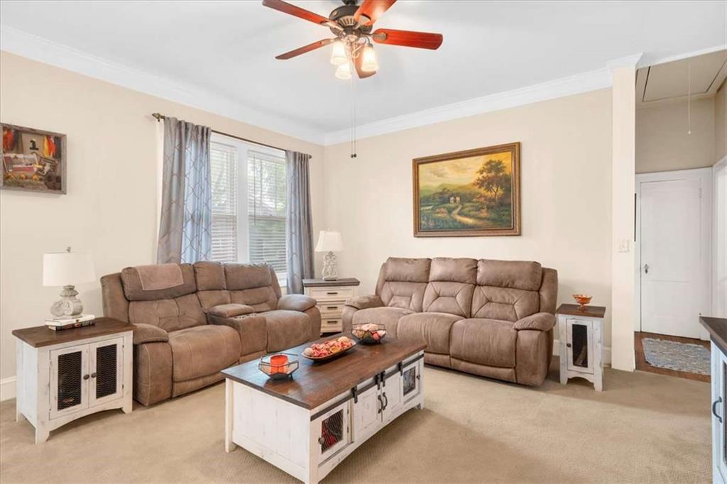 106 Westmore Road Southwest Rome, GA 30165 - Photo 28 of 56 a living room with furniture and a window