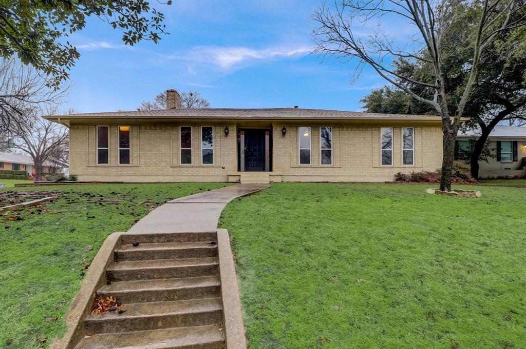 5107 Everglade Road Dallas, TX 75227 - Photo 1 of 1 a front view of a house with a yard