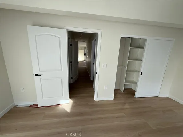 a bathroom with a shower and a sink