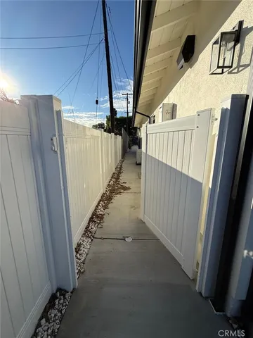 a view of a backyard with sitting area