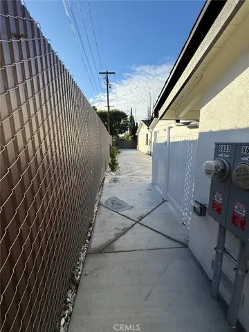 a view of a backyard with furniture