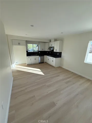 a view of kitchen and utility room