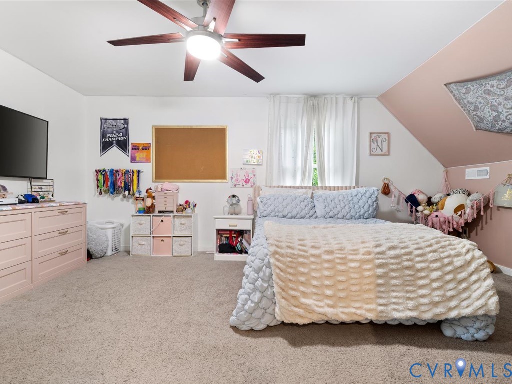 6806 Full Rack Circle Midlothian, VA 23112 - Photo 18 of 29 a bedroom with a bed and a flat screen tv