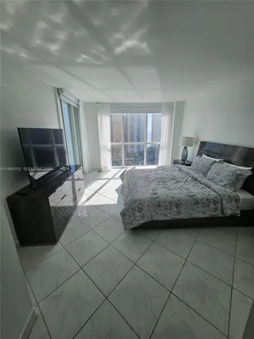 a kitchen with a sink and a stove