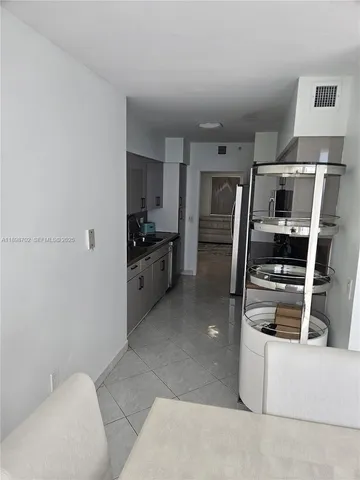 a bathroom with a toilet and a bathtub