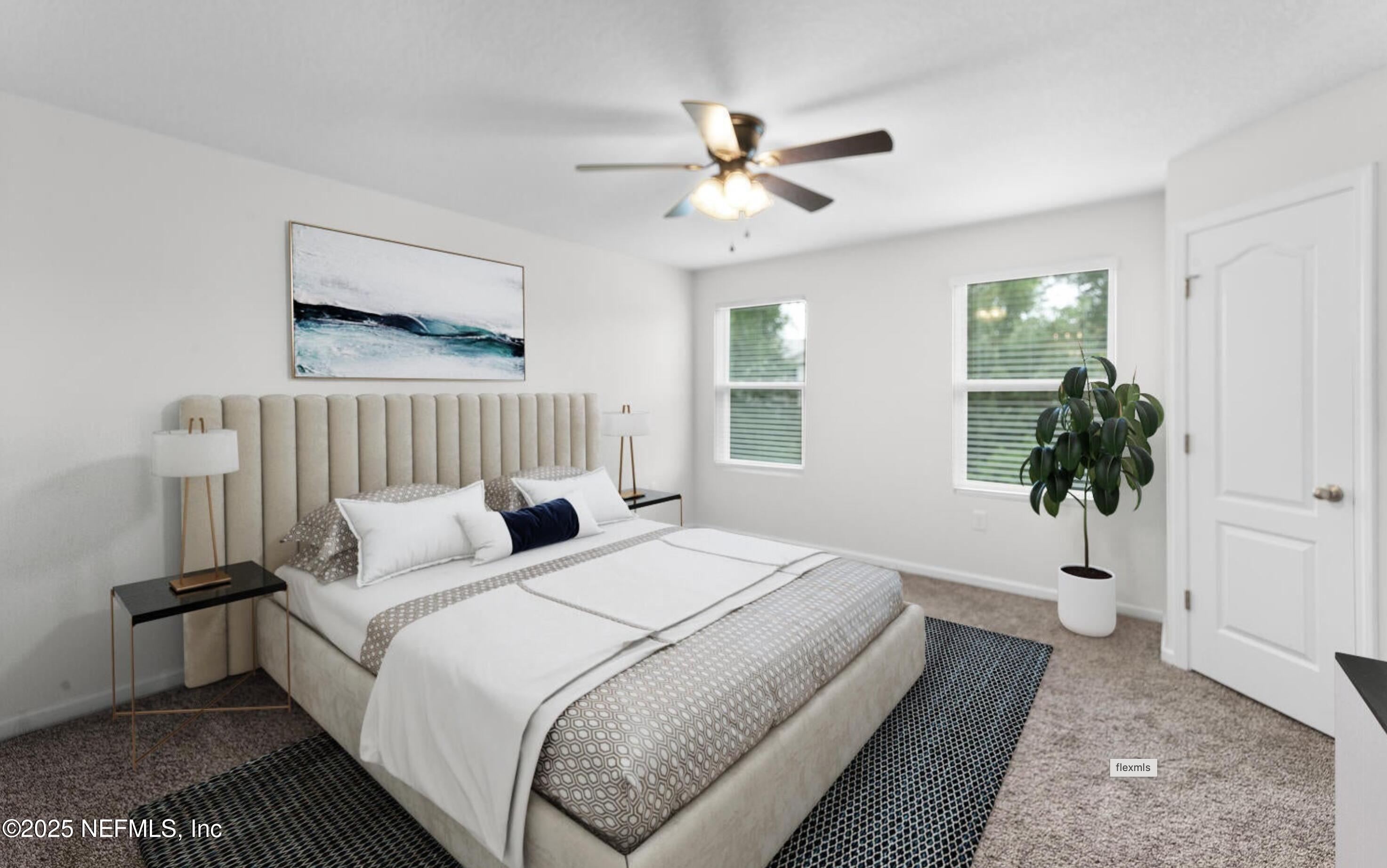 8039 Echo Springs Road Jacksonville, FL 32256 - Photo 13 of 22 a bedroom with bed and a window