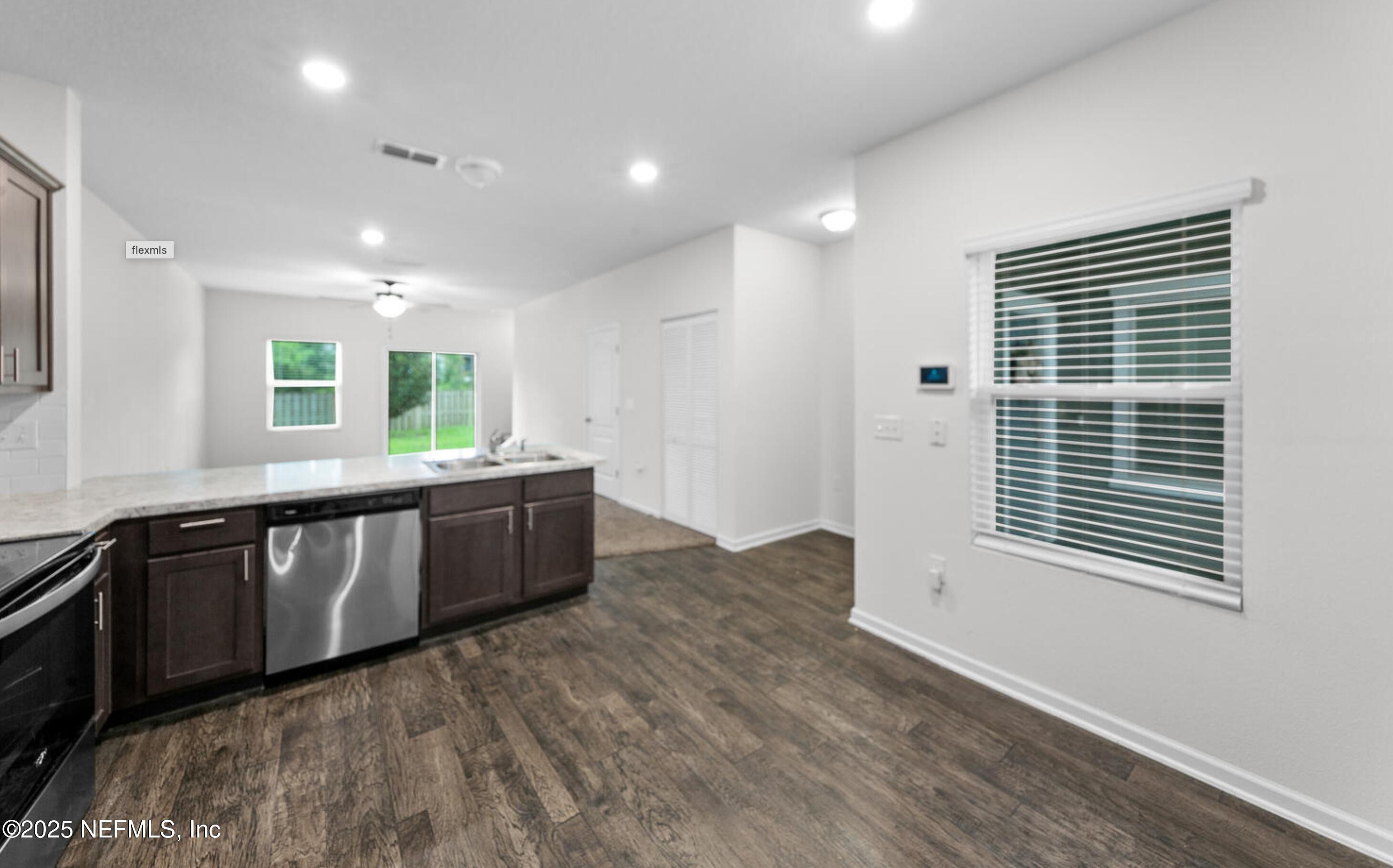 8039 Echo Springs Road Jacksonville, FL 32256 - Photo 6 of 22 a view of an empty room with a window