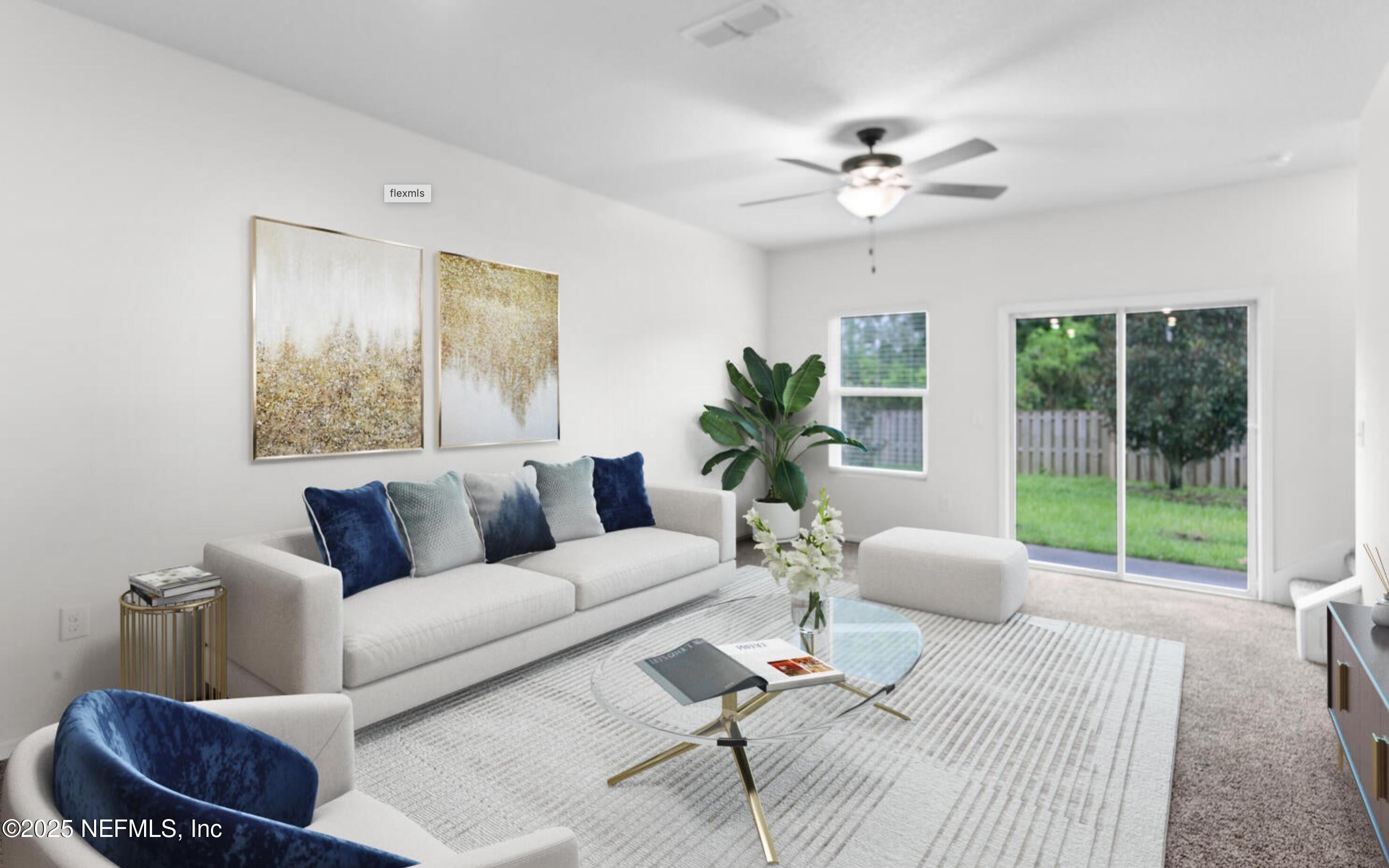 8039 Echo Springs Road Jacksonville, FL 32256 - Photo 7 of 22 a living room with furniture and a large window
