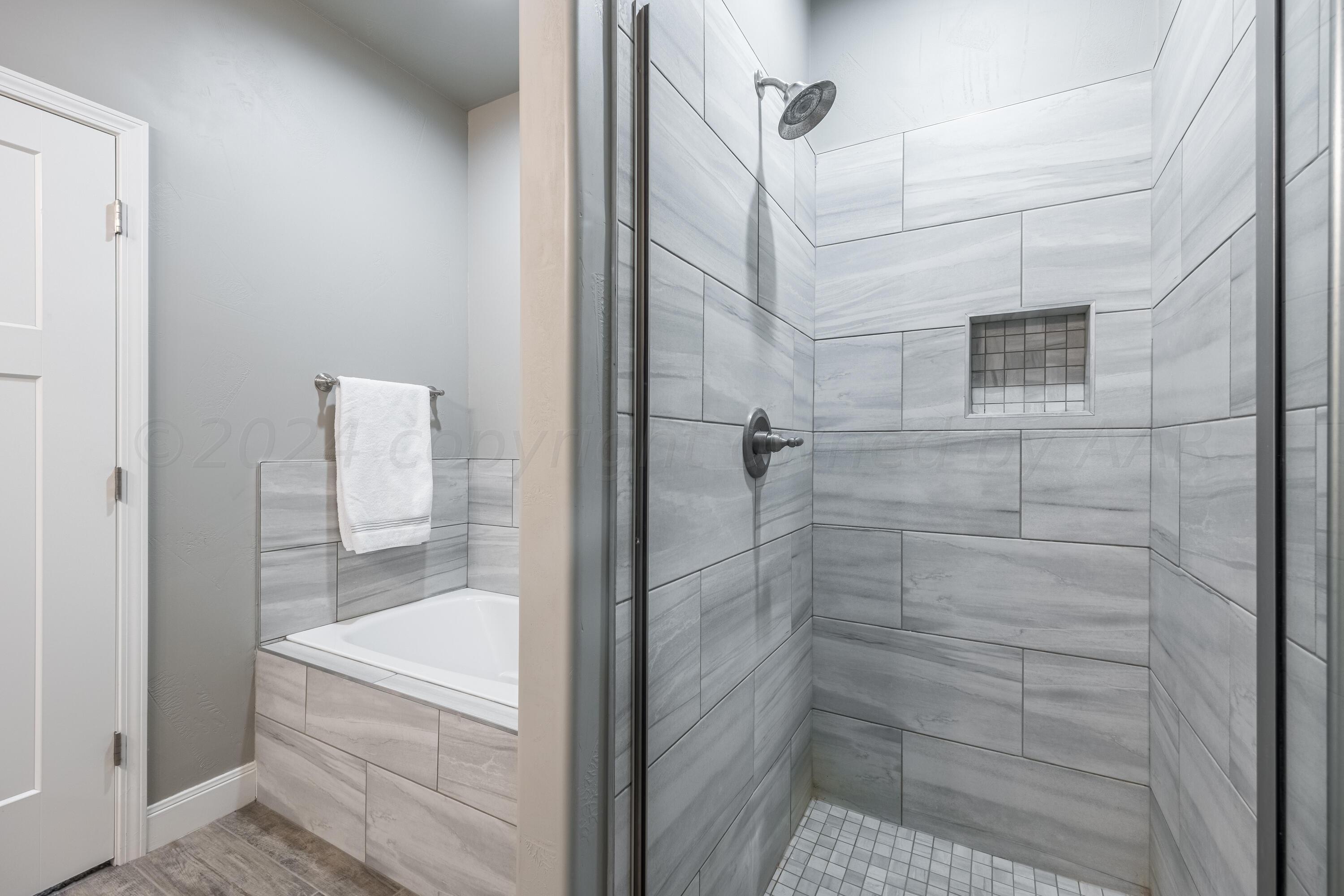5 Gimball Drive Canyon, TX 79015 - Photo 17 of 36 a bathroom with a shower