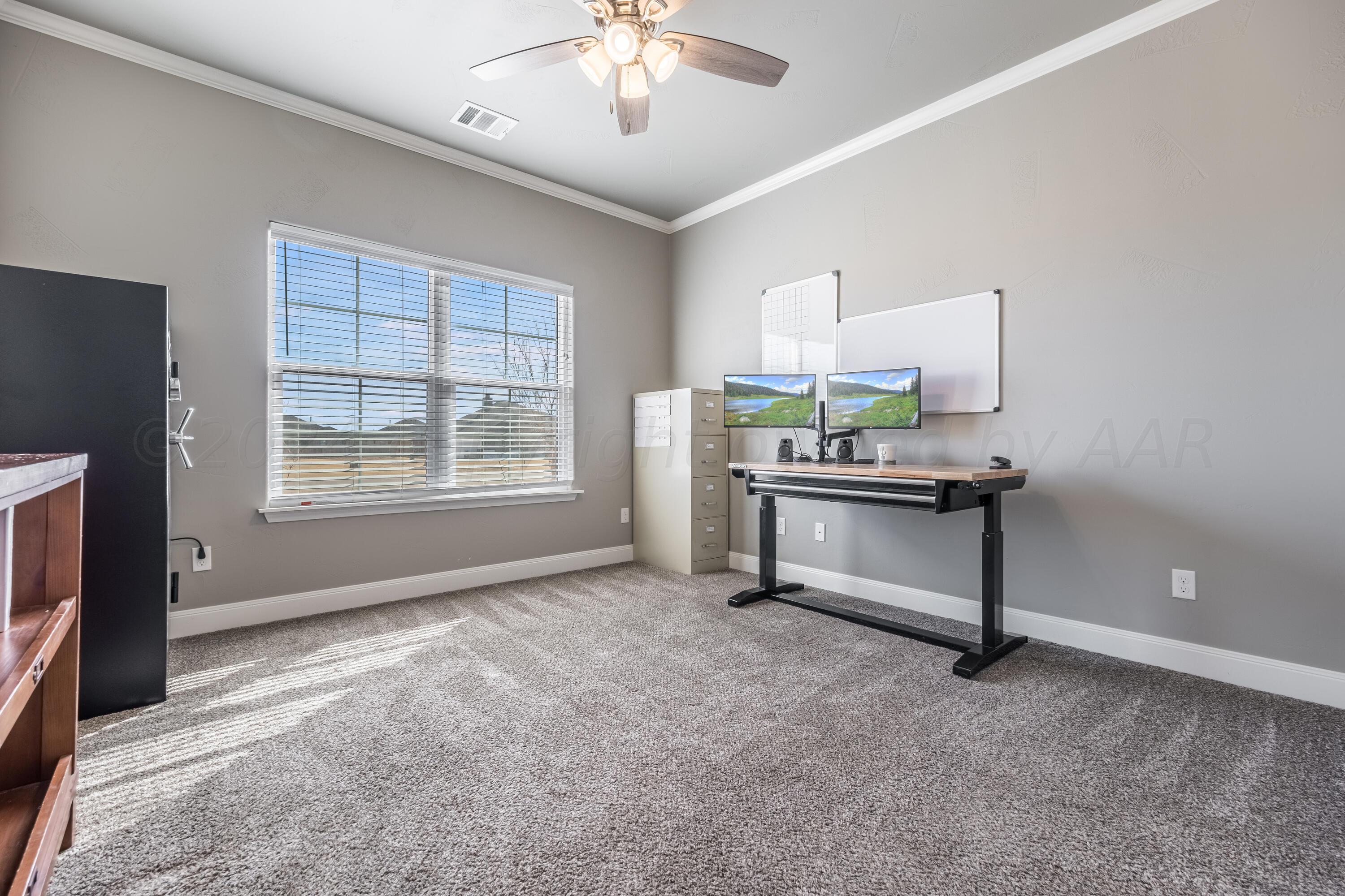 5 Gimball Drive Canyon, TX 79015 - Photo 24 of 36 a workspace with furniture and window