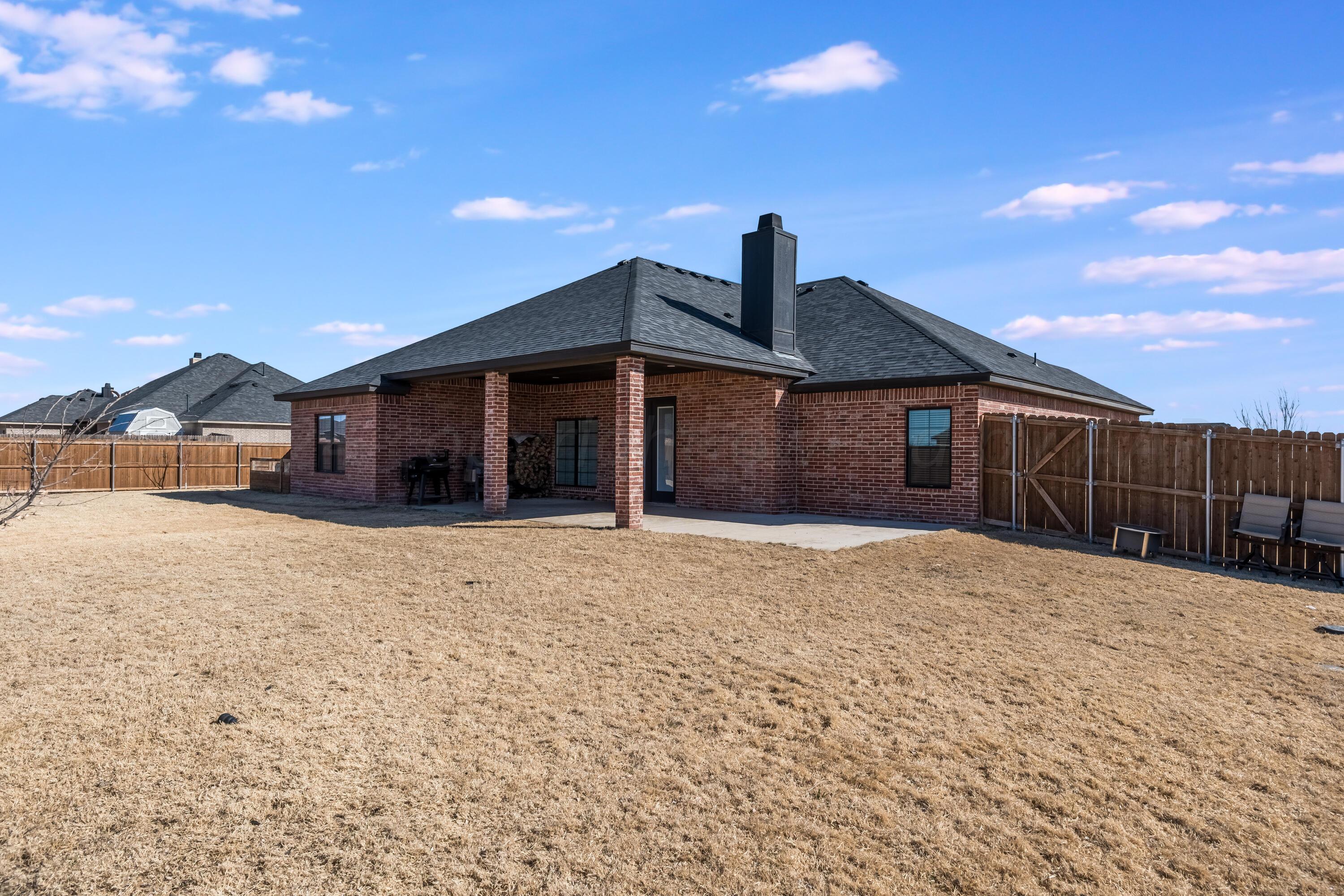 5 Gimball Drive Canyon, TX 79015 - Photo 30 of 36 a front view of a house with a yard