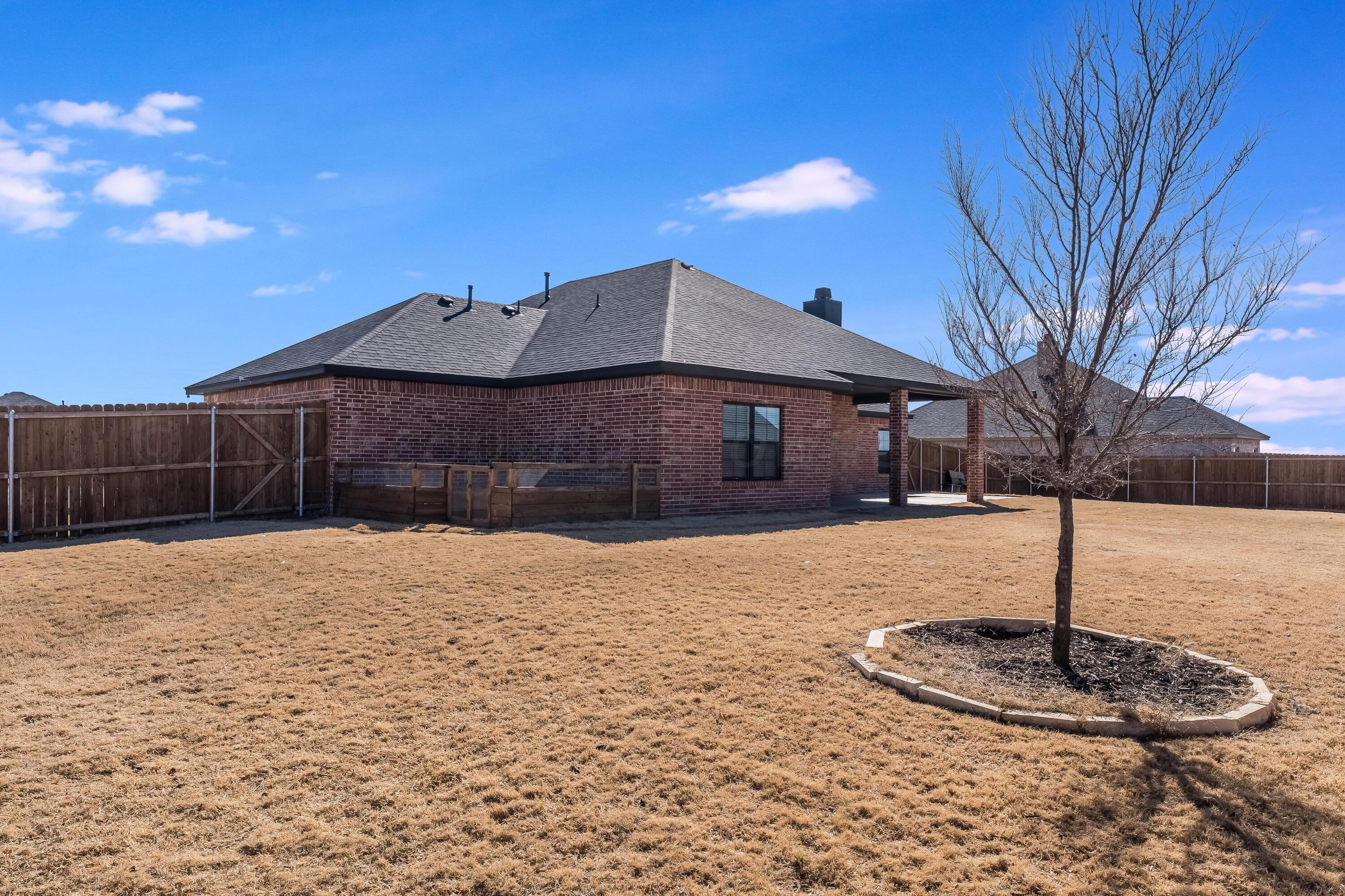 5 Gimball Drive Canyon, TX 79015 - Photo 33 of 36 a front view of a house with a yard