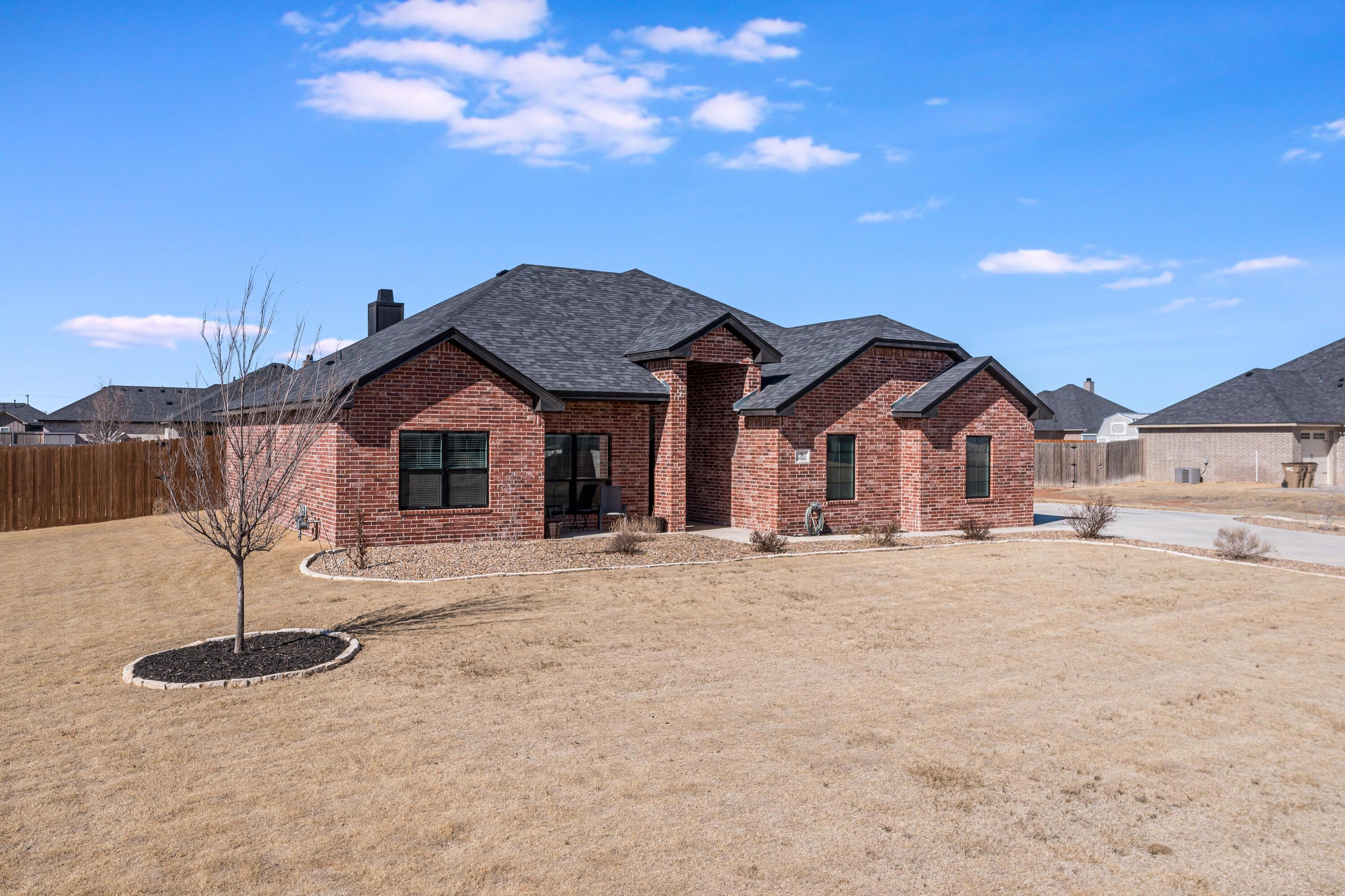 5 Gimball Drive Canyon, TX 79015 - Photo 35 of 36 a front view of a house with a yard