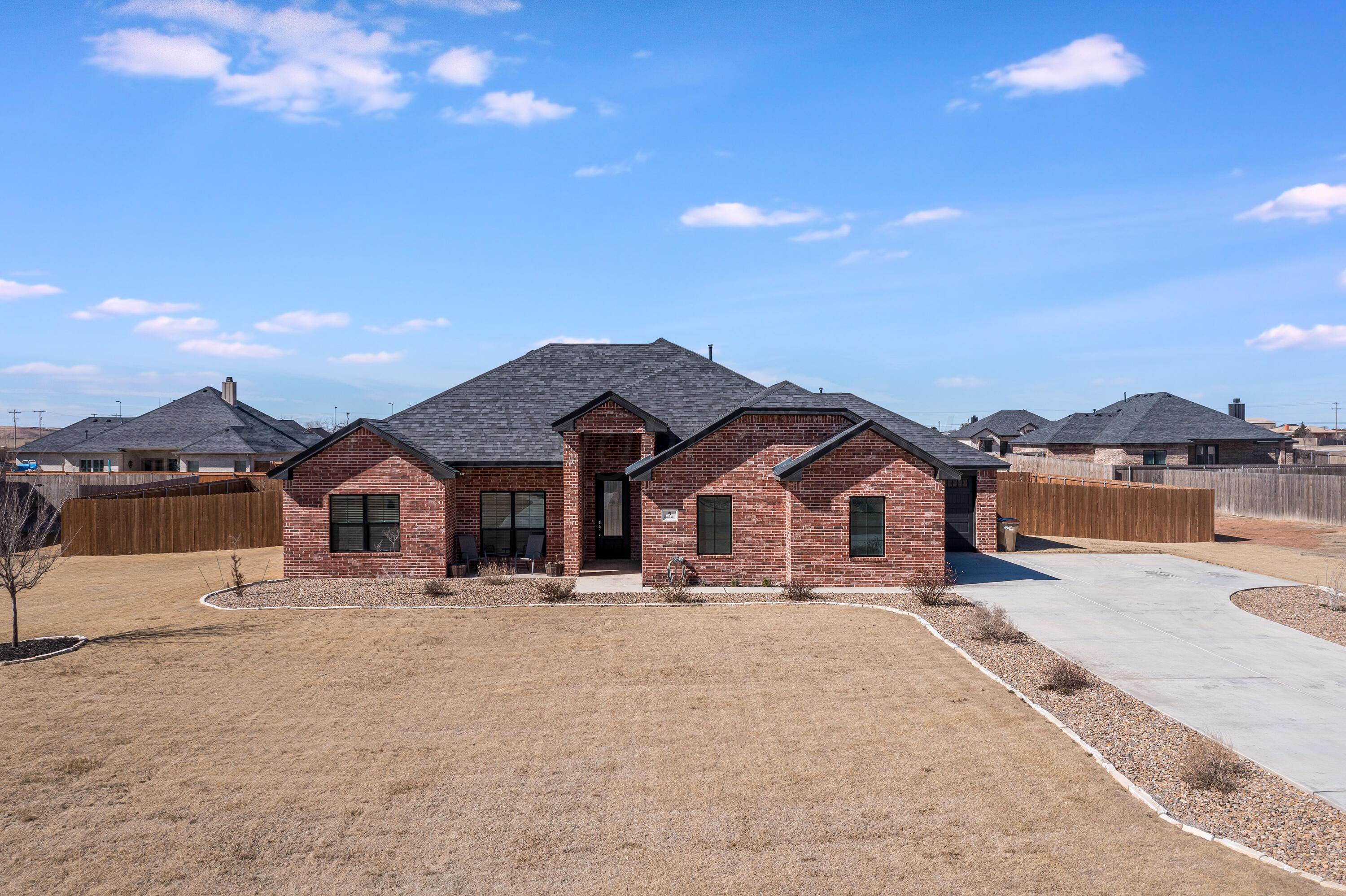 5 Gimball Drive Canyon, TX 79015 - Photo 36 of 36 a front view of a house with a yard