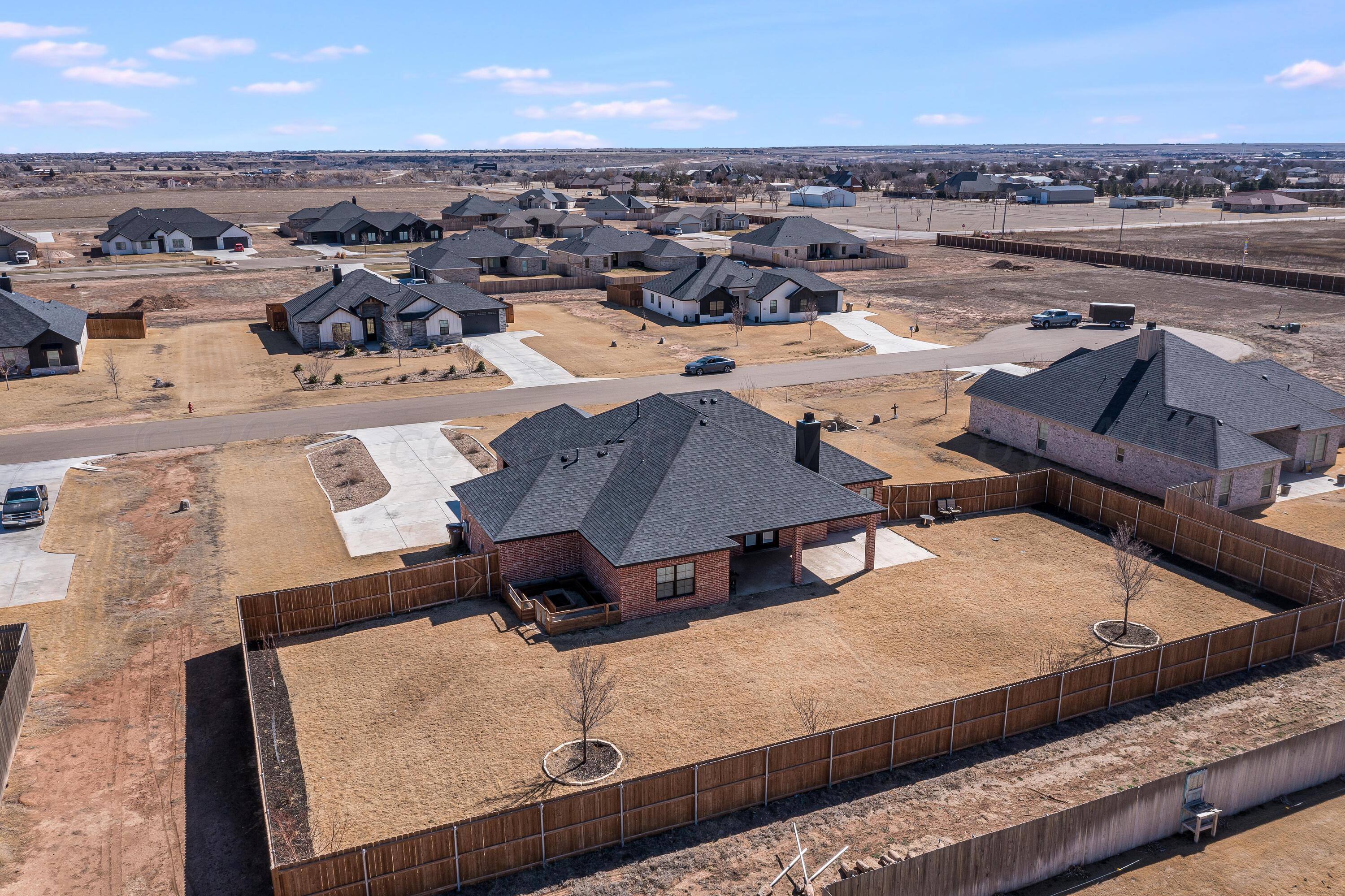 5 Gimball Drive Canyon, TX 79015 - Photo 4 of 36 an aerial view of residential houses with outdoor space