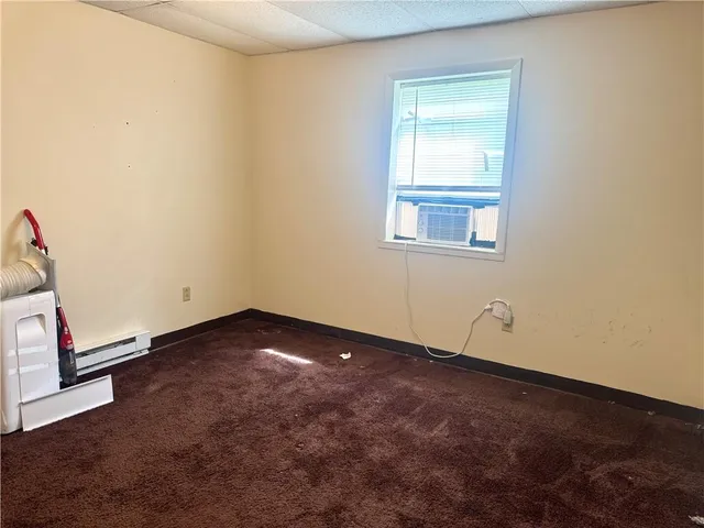 a white refrigerator freezer sitting inside of a kitchen