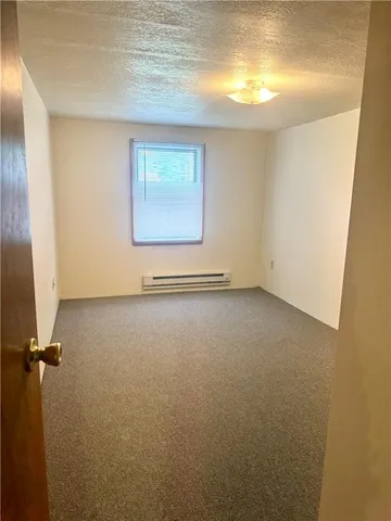 a view of a room with a window